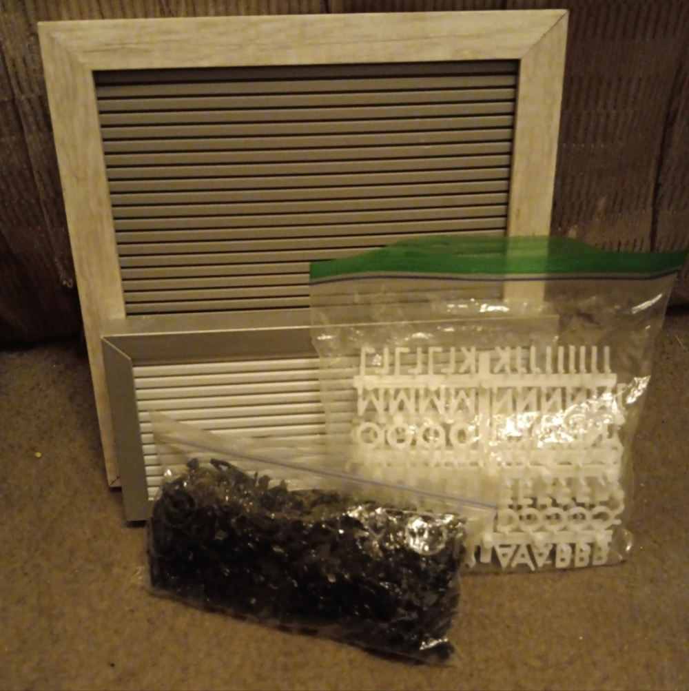 2 letter boards with letters and numbers